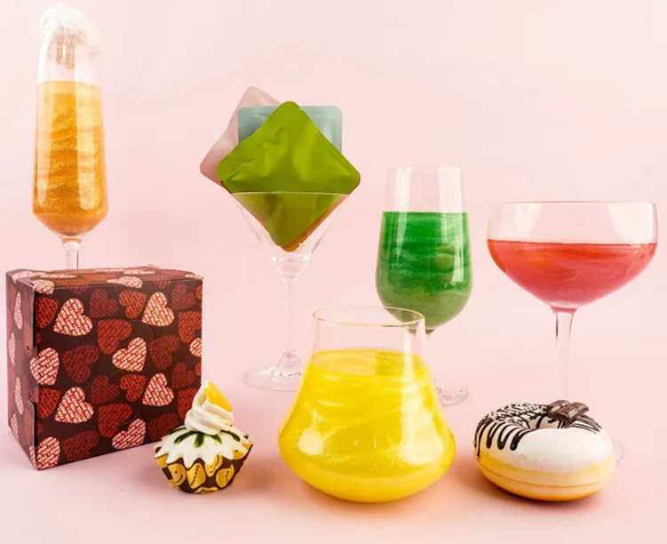 Cotton Candy Glitter Bombs How to Make Any Clear Drink Camera-Ready