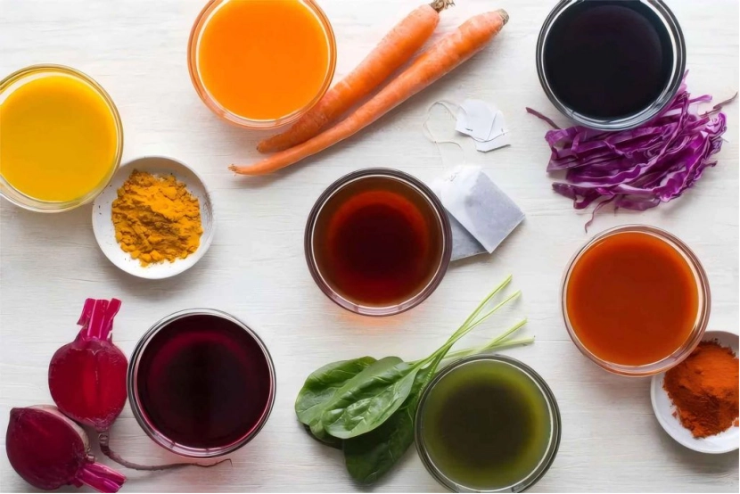 Various colorful liquids in glass bowls