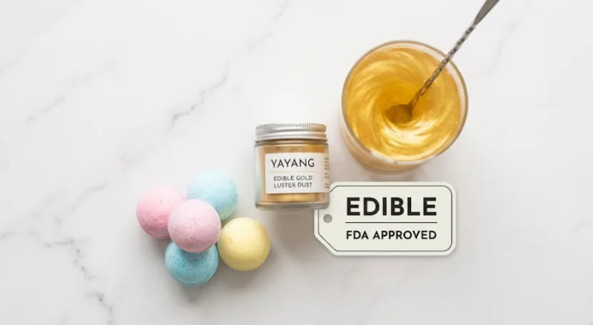 Edible gold dust, candy bombs, and a stirred gold drink on marble.