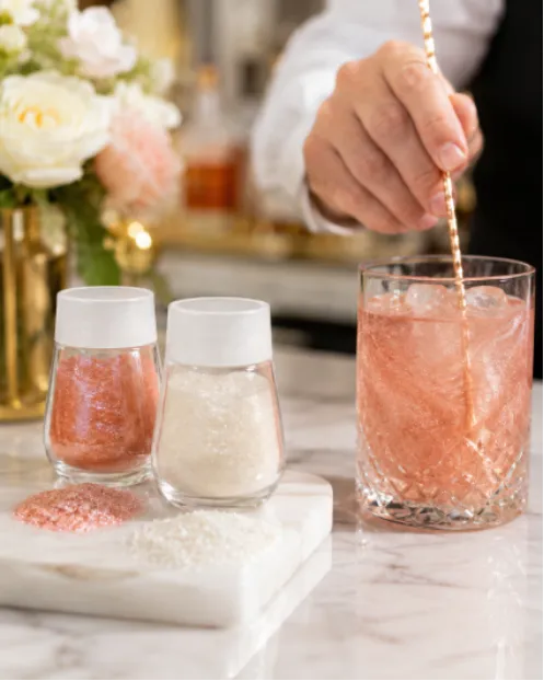 Making a rose gold glitter wedding cocktail
